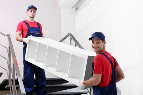 Removal Company Battersea team sorting recyclable materials and reusable items