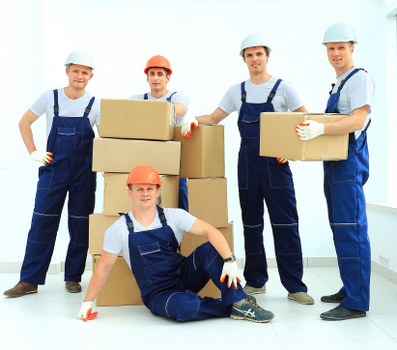 Local removals team loading items for a student move in Battersea