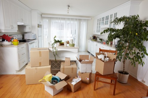 Professional movers handling furniture in Battersea