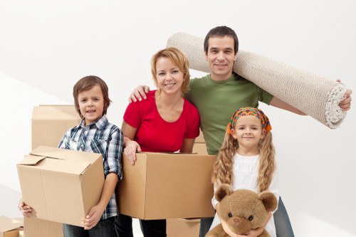 Loading furniture into a moving truck in Battersea