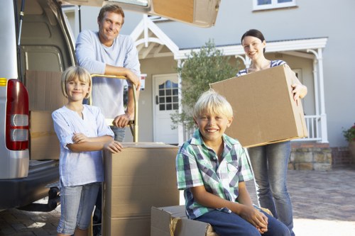 Professional movers loading boxes for a Battersea relocation
