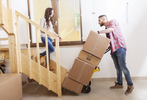 Professional movers assisting with an apartment move in Battersea